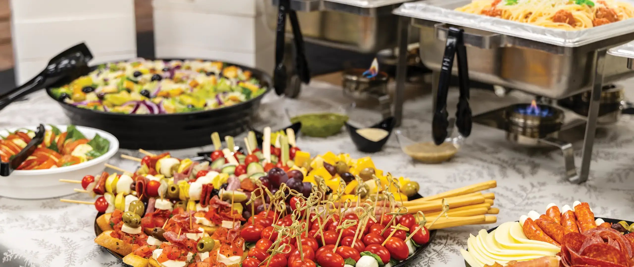 Buffet style food in containers